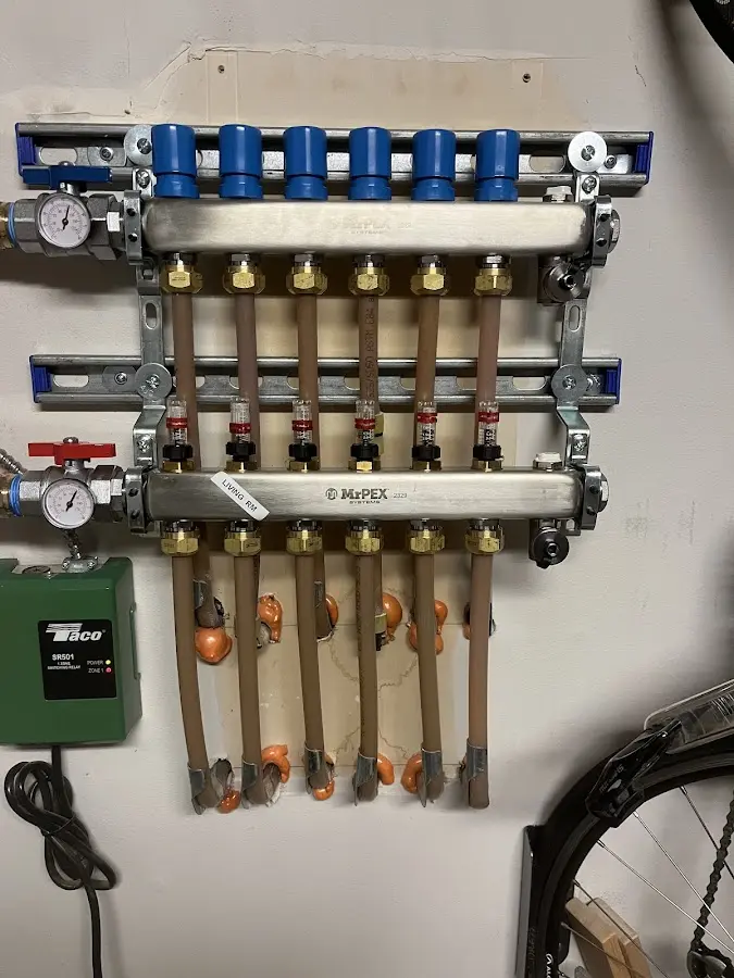 Plumber performing Gas Leak Detection at a residential property in Algonac